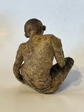 Sittende Kvinne
